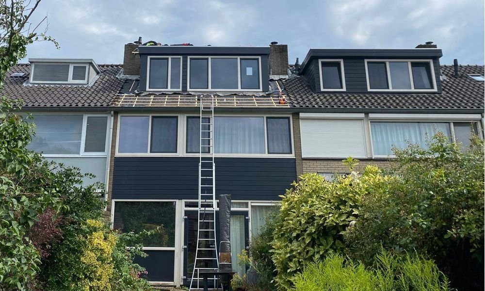 Wat kost een plat dak herstellen in Borger?